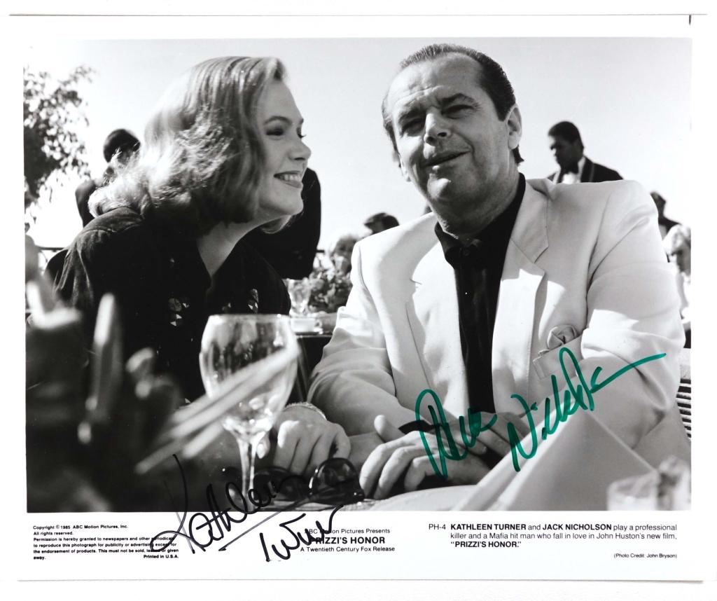 Autographs: Kathleen Turner & Jack Nicholson: Kathleen Turner and Jack Nicholson DOUBLE SIGNED 10-1/8 x 7-15/16" black & white ABC Films promotional photo for the film "Prizzi's Honor". Both actors won Golden Globes for their performances in this