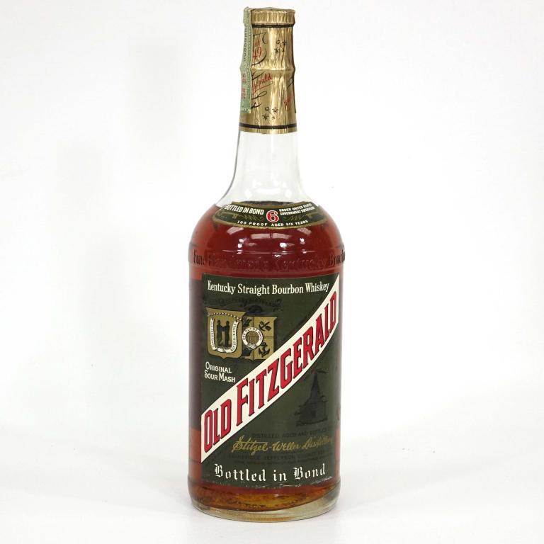 Bottle:1966 / 72 Old Fitzgerald Bot. in Bond Quart: ****You must speak with Ian before bidding on bottles if you may need shipping.**** Very little sediment at bottom, but contents clear. 6 years old. 100 proof. Strip # 00868884. Distilled Fall 1966, B