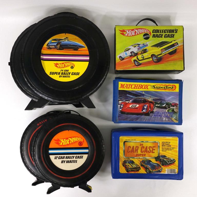 Die-Cast Car Storage & Cars: Hot Wheels tire 24-car car storage x2 (1968). Hot Wheels tire 12-car rally case x2 (1987). Matchbox/Lesney 24-car storage case (1970). Hot Wheels Race Case (1969) - missing one tray. Super car case, 2