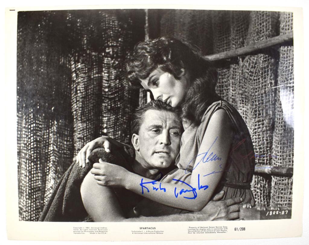 Autographs: Kirk Douglas & Jean Simmons: DOUBLE SIGNED 10-1/16 x 7-7/8" black and white vintage NSS promotional photo for the Stanley Kubrick classic "Spartacus", signed by Kirk Douglas (Spartacus) and Jean Simmons (Varinia). ** Lot 14 Aucti