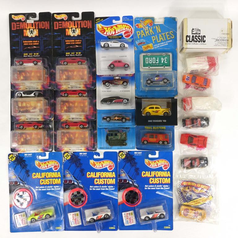 Assortment Of Vintage Hot Wheel Vehicles (24 Pcs.): 1 Hot Wheels Action Command Assault Crawler, 1988; 1 Hot Wheels Speed Fleet Chev Stocker, 1988; 1 Hot Wheels Park'N Plates '34 Ford, 1988; 2 Hot Wheels California Custom Cobra (White And Orange), 1989