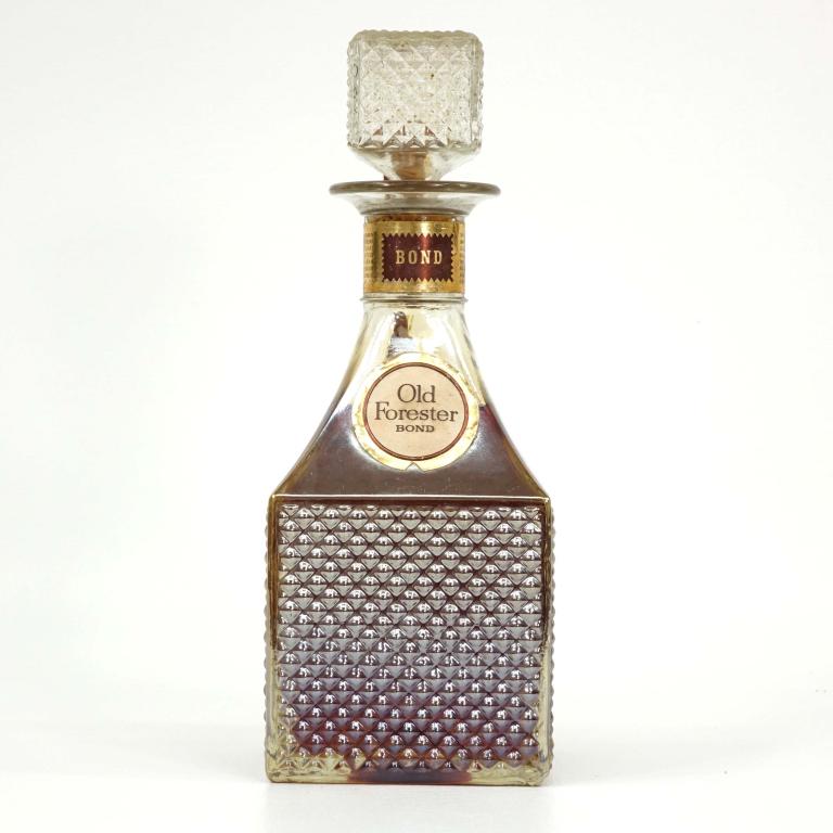 1968 Old Forester Bourbon Whisky Decanter: *** If shipping is needed, please call Ian at Lot 14 BEFORE bidding *** 4/5 Qt. Sealed. Bottled in Bond, 100 Proof