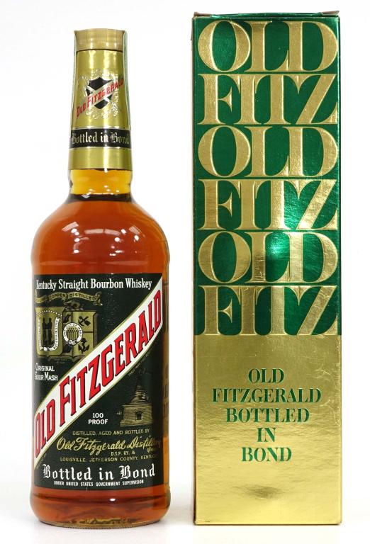 1984 (?) Old Fitzgerald Bourbon Whiskey Bottle: *** If shipping is needed, please call Ian at Lot 14 BEFORE bidding *** Bottled in Bond, 100 Proof. 6 year old, 750 ml. Good fill. With green over gold box. DSP KY16.