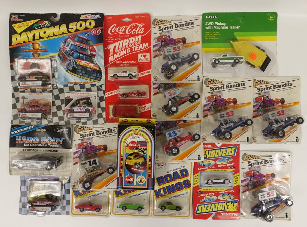 Assorted Die-Cast Cars: 7 Grippers Sprint Bandits, 3 Road Kings, 1 Lionel Revolvers, 1 Tootsietoy Hard Body, 1 Racing Champions, 1 Ertl Pickup, 1 Racing Champions Set, 1 Coca Cola Jukebox box, 1 Coca Cola Turbo Racing Team S