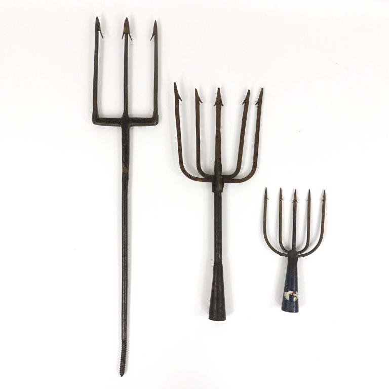 Three Iron Fishing Spears (3): No markers mark on two spears, partial sticker on smallest spear. 8" x 4", 15" x 6", 23.5" x 4.5".