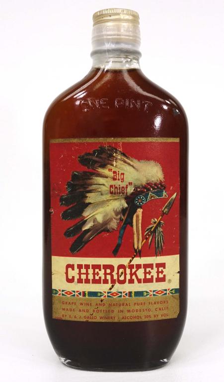 Pint - Cherokee Grape Wine: *** IF YOU MAY NEED SHIPPING YOU MUST CALL IAN BEFORE BIDDING ON BOTTLES *** Pint - Cherokee Grape Wine (Bar piece). Gallo, 20% alcohol.