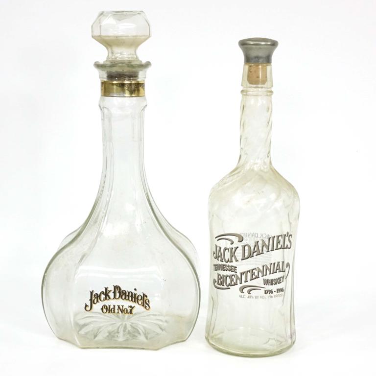 Bottles: Jack Daniels Riverboat Captain's Bottle: 1.75L, no literature. Also includes Jack Daniels bicentennial bottle. If you anticipate needing bottles shipped you MUST talk to Ian PRIOR to BIDDING! 847-625-0555.