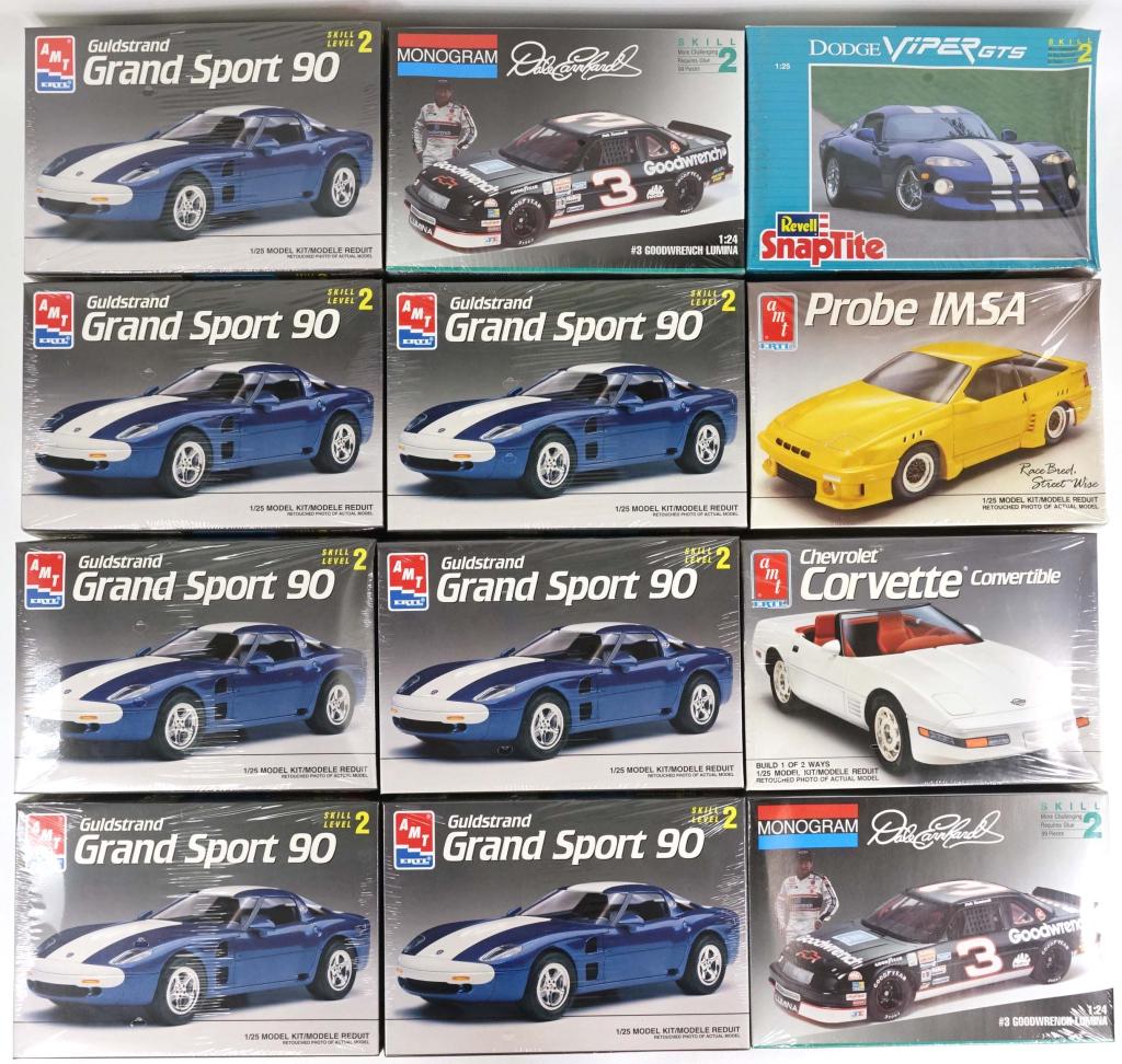 12 Assorted Car Model Kits: 9 AMT Ertl, 1 Revell Snaptite, 2 Monogram. Includes a Corvette. ALL IN ORIGINAL SHRINKWRAP.