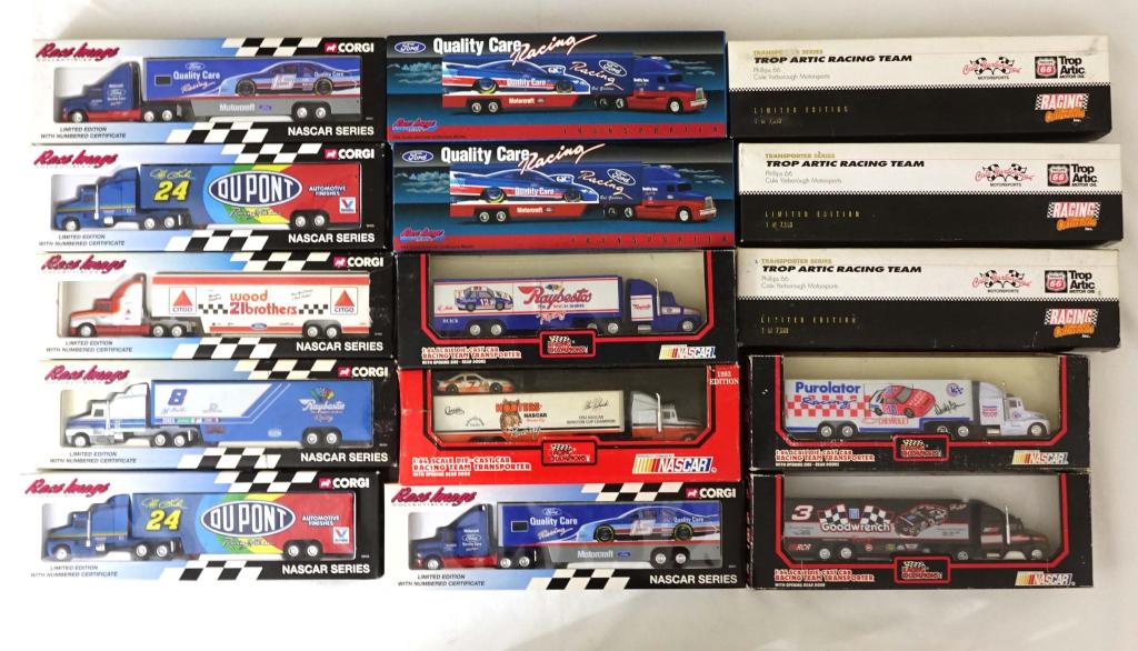 15 Assorted Model Trucks: 8 Race Image, 3 Racing Collectibles, 4 Nascar Racing Champions. Boxes in varying conditions.