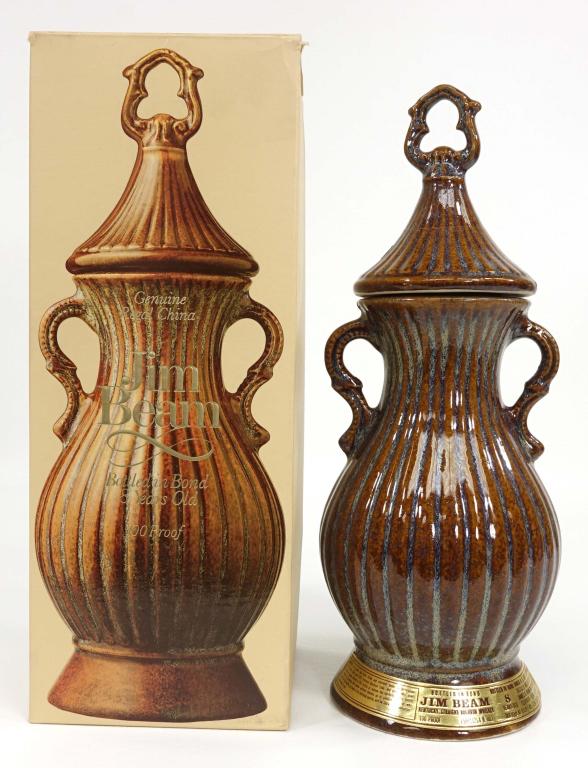 1979 Bottled in Bond Jim Bean Decanter Bottle: *** If shipping is needed, please call Ian (847-625-0555) at Lot 14 BEFORE bidding *** Bottle: Bottled in Bond 8 Years Old. 750ml. 100 proof. D.S.P KY. 230. Sealed. Distilled: Spring 1968, Bottled: 19