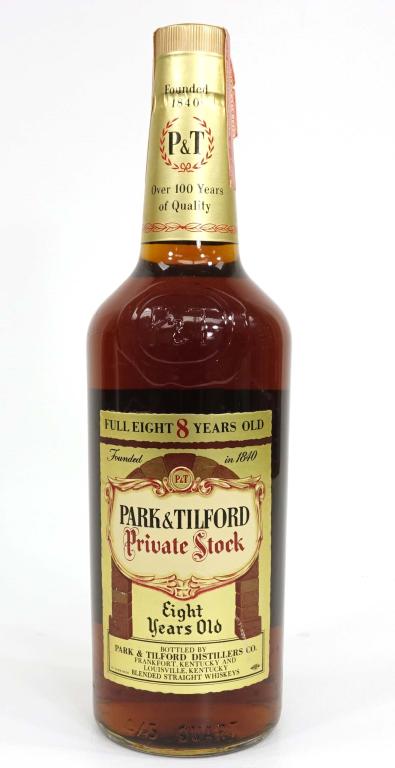 Park & Tilford Whiskey Bottle: ***IF YOU MAY NEED SHIPPING, YOU MUST CALL BEFORE BIDDING ON BOTTLES. 847-625-0555.*** Bottle: 8 year old, 4/5 quart, 86 proof. Likely '61 "Federal Law Forbids Sale" on bottle. Series 112 tax strip. S
