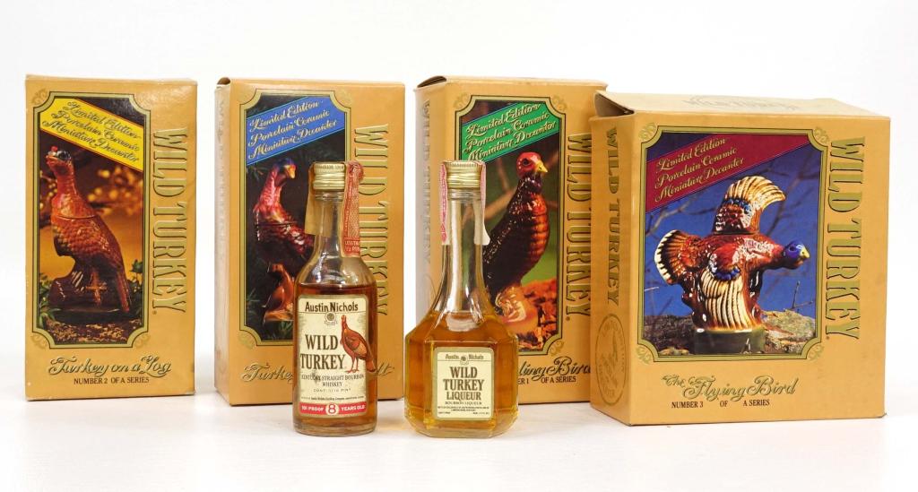 4 Boxed and Two Mini Wild Turkey Bottles: Whiskey & Liqueur. IF YOU MAY NEED SHIPPING YOU MUST SPEAK WITH IAN BEFORE BIDDING ON BOTTLES. Bottles: 4 Boxed and Two Mini Wild Turkey