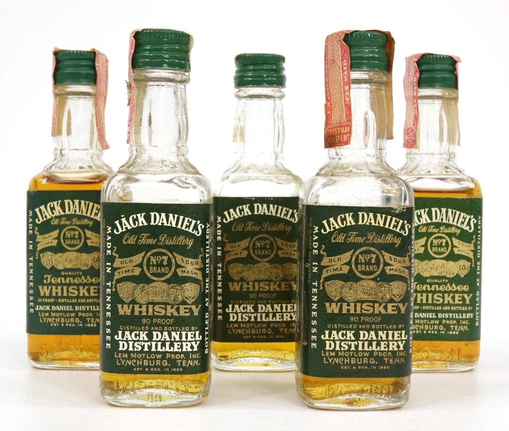 5 Green Label Mini Jack Daniel's Bottles: IF YOU MAY NEED SHIPPING YOU MUST SPEAK WITH IAN BEFORE BIDDING ON BOTTLES. 5 Green Label mini Jack Daniel's bottles.