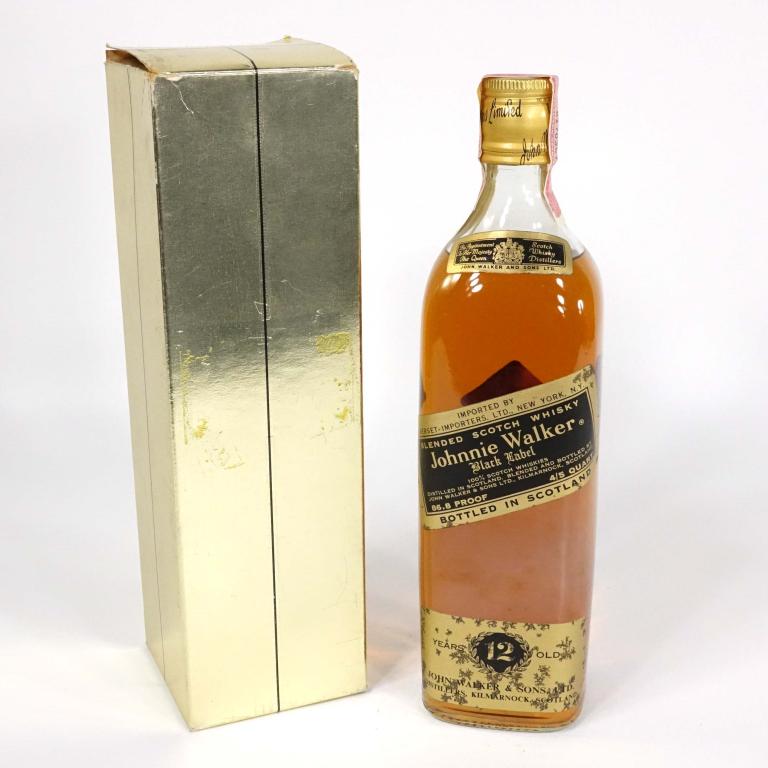 Johnnie Walker Black Label Scotch Bottle, 1976 (?): *** You MUST talk to Ian before bidding on any bottles! *** Gold Box. 12 Years Old. 86.8 Proof. 4/5 Quart. Bottom of bottle: S8984, A, 76. Tax strip number I-497, 6170725. Box is missing front label.