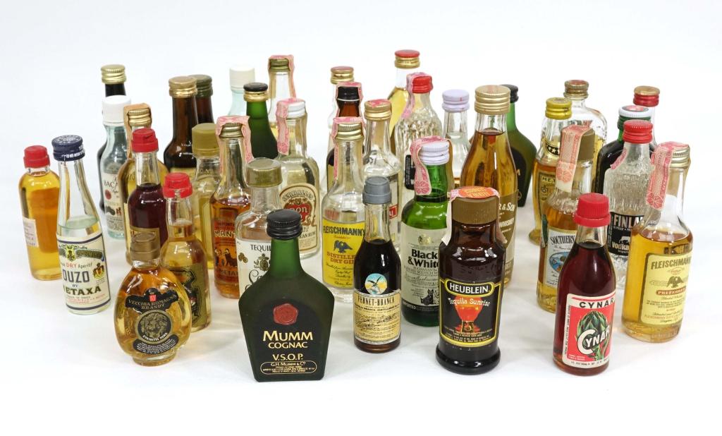 40 Mini Bottles Lot: LOCAL PICK UP ONLY - NO SHIPPING of THIS LOT. IF YOU BUY THIS LOT AND WILL NOT PICK IT UP, IAN WILL CHARGE YOU $100 to pack it + Shipping costs. Includes: mostly Whiskey, Tequila, and Rum.