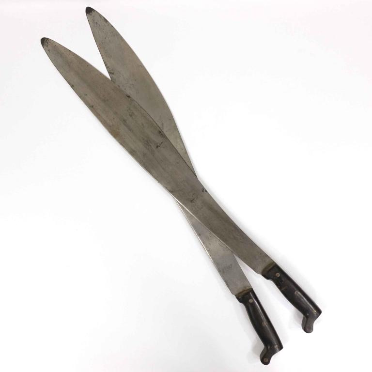 Pair of Machetes circa 1940: Pair of Legitimus Collins & Co. Machetes, circa 1940's. Overall length: 29.5". Made in the USA. No. 905.