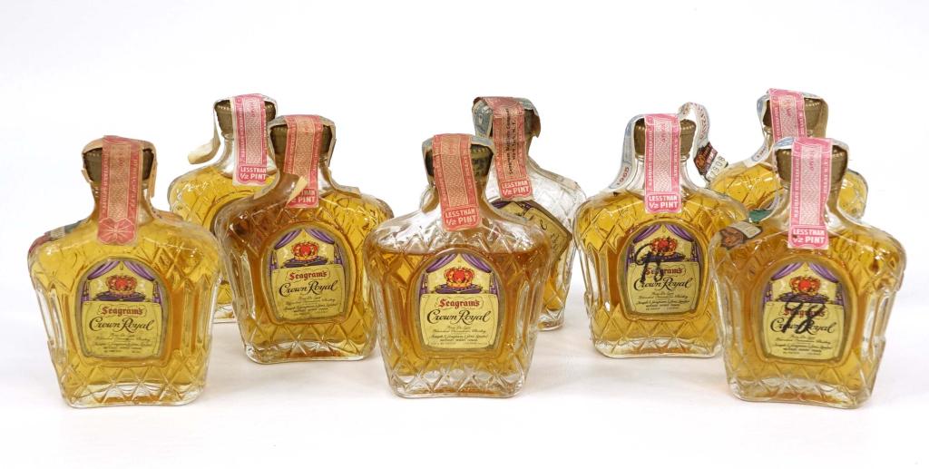 8 Mini Crown Royal Bottles: IF YOU MAY NEED SHIPPING YOU MUST SPEAK WITH IAN BEFORE BIDDING ON BOTTLES. 8 mIni Crown Royal, 1955-1969.