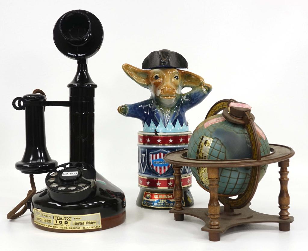 3 Full Jim Beam Whiskey Decanters: IF YOU MAY NEED SHIPPING YOU MUST SPEAK WITH IAN BEFORE BIDDING ON BOTTLES. 100 mo. old Bicentennial. Western Electric Telephone. 100 mo. Globe Decanter.