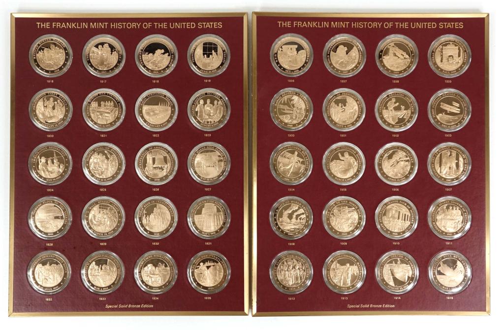 Franklin Mint History of the U.S. Medal Set: 200 bronze medallions in capsules, in trays, in a wood presentation box with historical reference folders. 1776-1976.