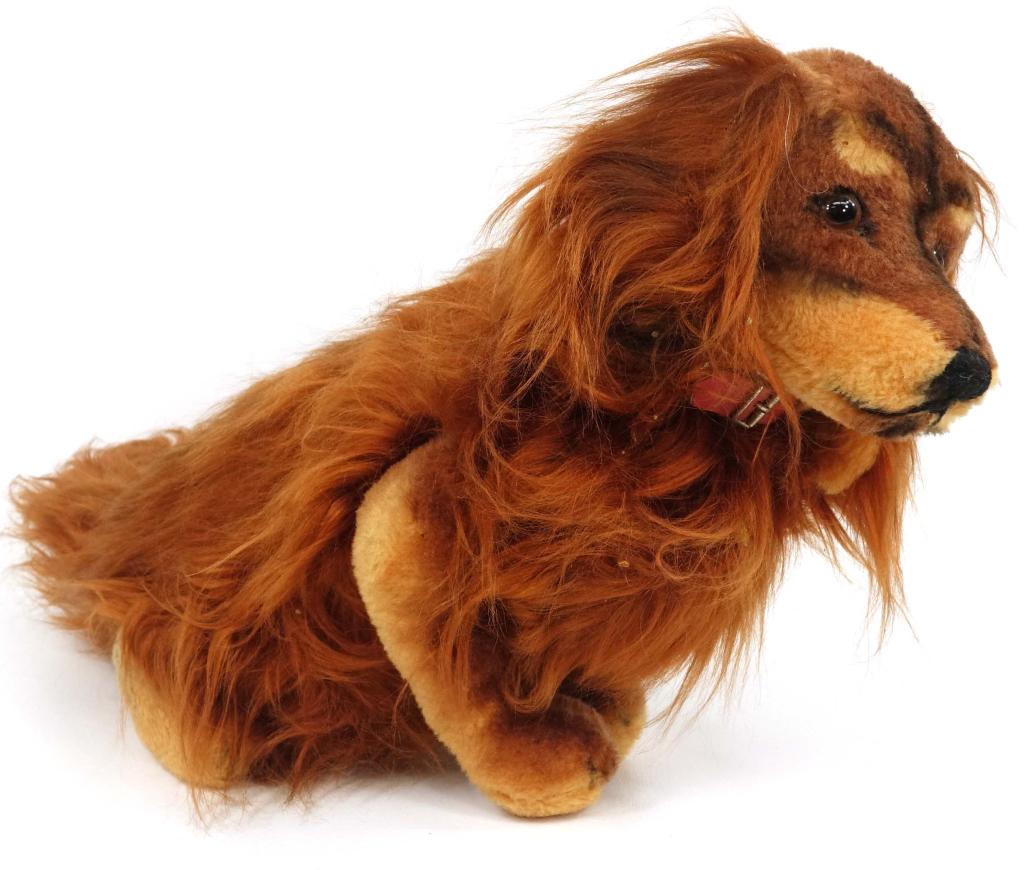 Steiff Waldi Dachshund Dog: Steiff Waldi Dachshund Dog. Made in the 1960's & 1970's in West Germany. 26in. long. Has all tags. Minor damage to fur.
