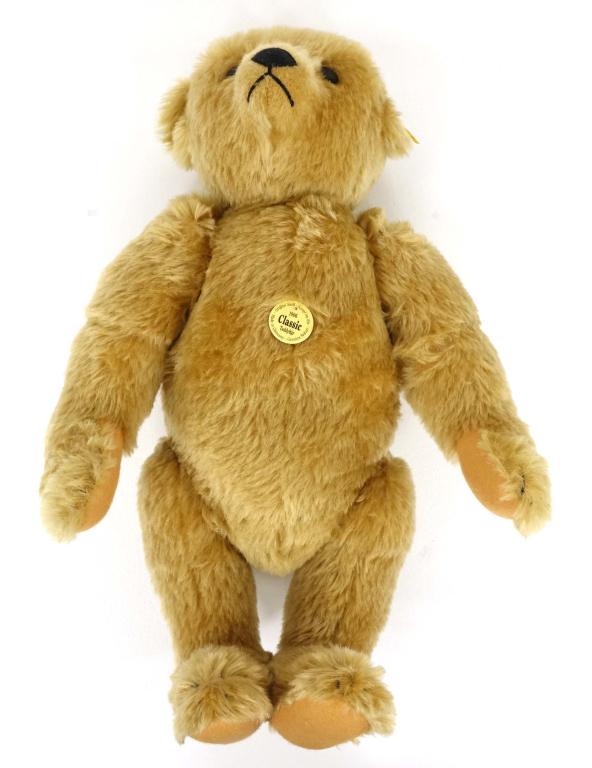 Steiff 1906 Teddy Bear Replica: Steiff 1906 Teddy Bear replica with working growler. 20in. long 5 jointed. Made in Germany. Decent condition with tags still attached.