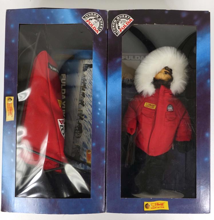 Steiff Fulda Yukon Quest Husky Set (2): Steiff Fulda Yukon Quest Husky Set. Includes the Steiff Musher Doll (#038624), & the Steiff Sledge with basket (#038617). Both are in good condition with minor wear to boxes. Also contains certificate