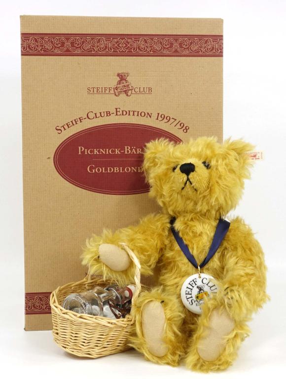 Steiff Gold Blond Picnic Bear (1997): Steiff Gold Blond Picnic Bear (1997). From the Steiff Club Collection. 17in. Model number (#420108). Pristine condition never been opened with all certificates.