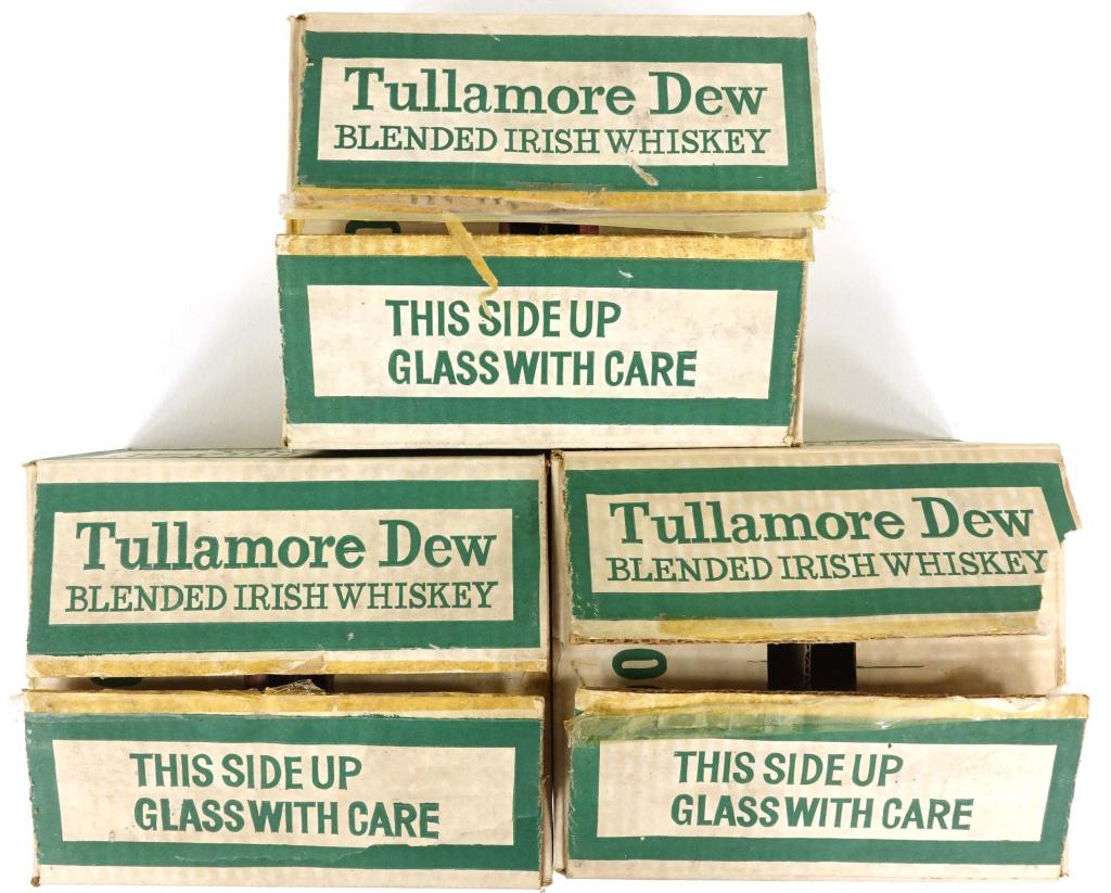 45 Mini Tullamore Dew Whiskey Bottles: 3 original boxes (note: one box flap stuck to seals on caps). 8 year old Specially Light, 1/10 pint. 86 proof. IF YOU MAY NEED SHIPPING YOU MUST SPEAK TO IAN BEFORE BIDDING ON BOTTLES.