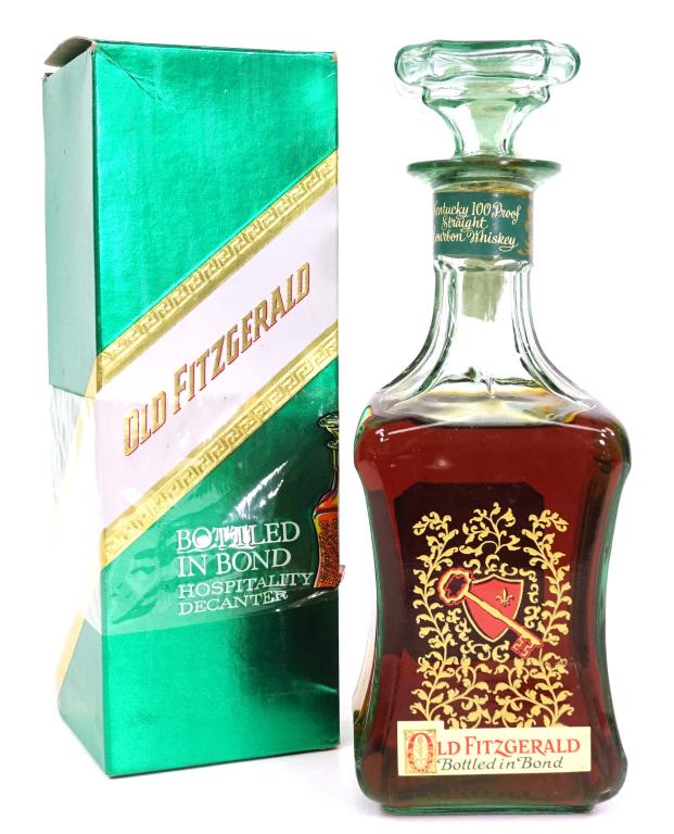 1973 Old Fitzgerald Bottled in Bond Decanter: ***IF YOU MAY NEED SHIPPING YOU MUST CALL BEFORE BIDDING ON BOTTLES! 847-625-0555*** Decanter: 1973 Old Fitzgerald Bourbon Bottled in Bond Hospitality Decanter in green box with cello. 6 year, 100 pro