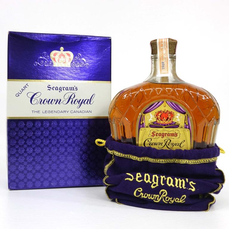 Crown Royal Quart Bottle: IF YOU MAY NEED SHIPPING YOU MUST SPEAK WITH IAN BEFORE BIDDING ON BOTTLES. With bag and box. 80 proof. 750 ml. 1969.