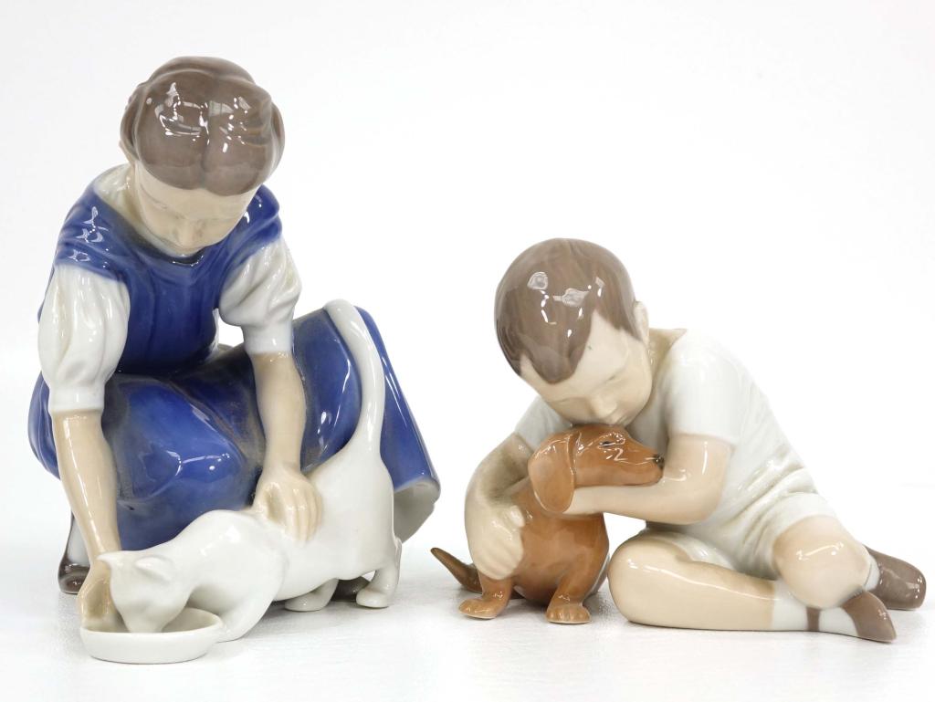B&G Figurines #1951 & 1745 (2): B&G Figurines. Includes Bing & Grondahl Figurine Boy with Dachshund #1951 + Bing & Grondahl Figurine Girl with Cat #1745.