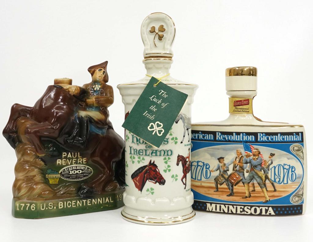3 Whiskey Decanters (Broken Seals): IF YOU MAY NEED SHIPPING YOU MUST SPEAK WITH IAN BEFORE BIDDING ON BOTTLES. Broken seals. Old Commonwealth - 7 year, 80 proof, 750 ml. Early Times - 1976 Bicentennial, 86 proof, 4/5 quart. '76 Old Mr.