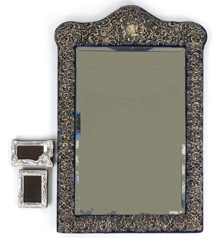 1901/02 Sterling Silver English Gilded Mirror: Birmingham hallmarks. 12.75 x 19.75. With 2 small silver frames. One of the small frames (silver front) is separated from frame (glue failed).
