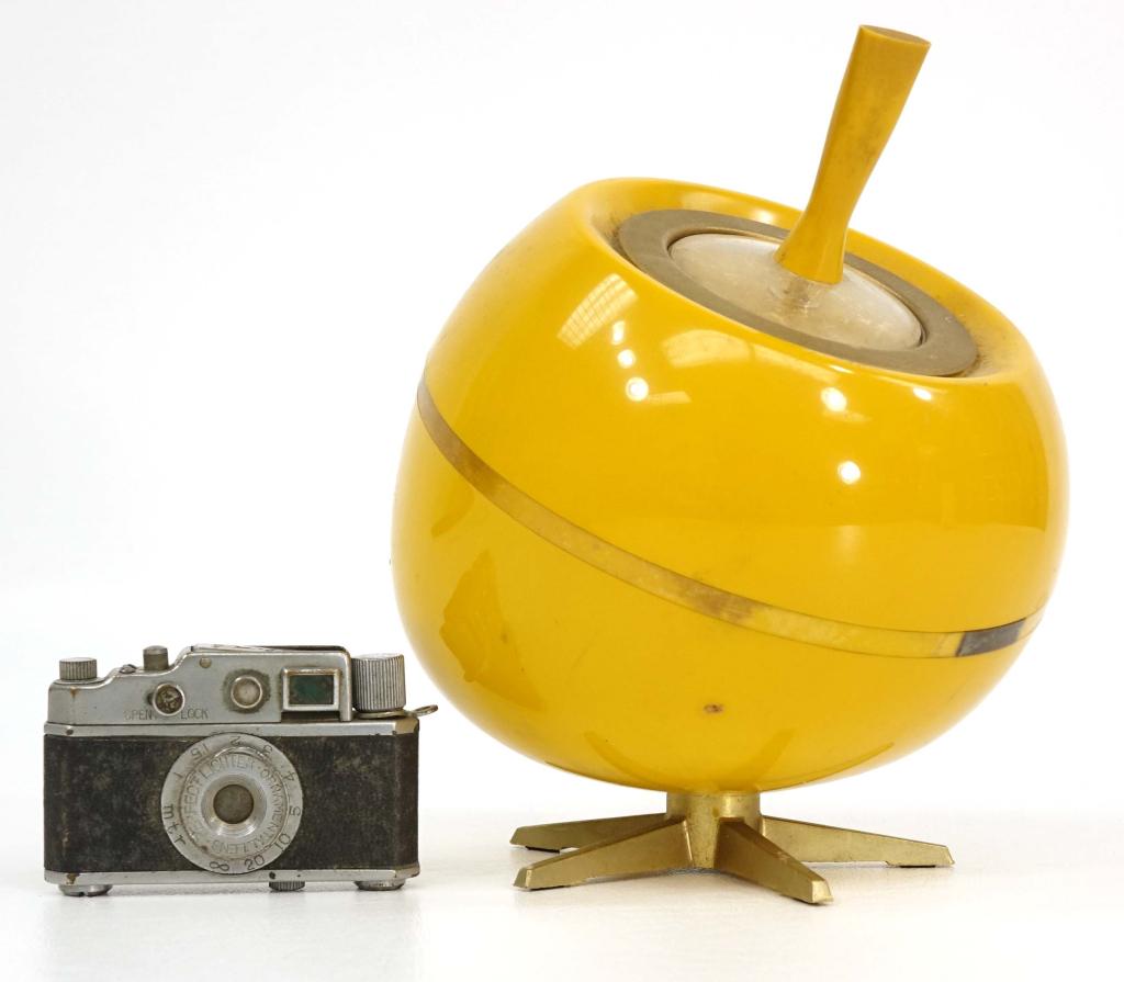 MCM (Apple) Yellow Bakelite Lighter: With Tokyo-made novelty camera lighter.