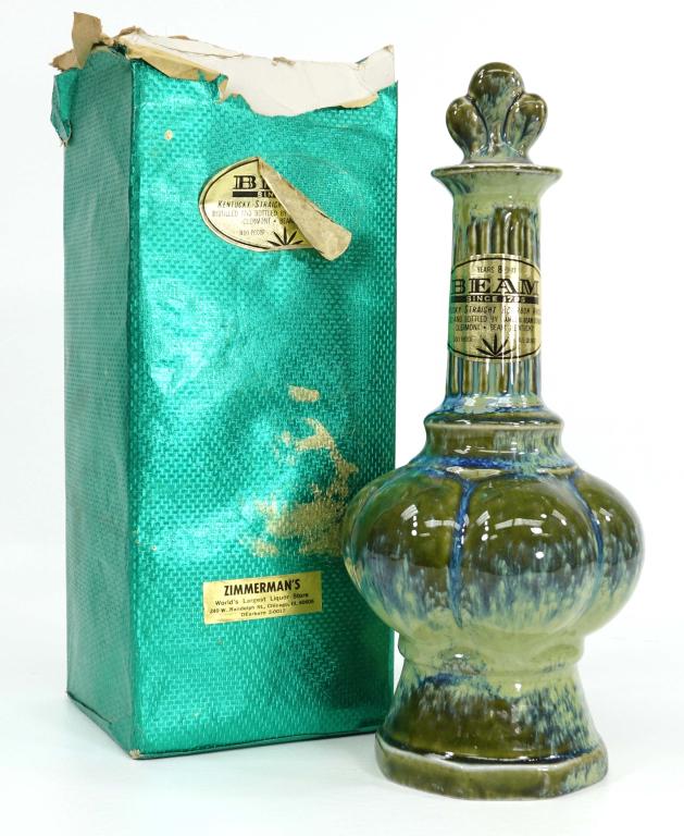 1972 8 Year Beam Bourbon Whiskey Decanter: IF YOU MAY NEED SHIPPING YOU MUST SPEAK WITH IAN BEFORE BIDDING ON BOTTLES. With tax strip and box. Box is in rough shape. 100 proof.
