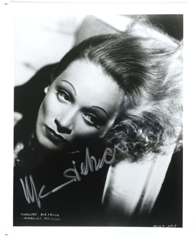 Marlene Dietrich Autograph: Marlene Dietrich signed 8 x 10" black and white picture. ** Lot 14 makes the following guarantee: If either Professional Sports Authenticator (PSA) or Beckett Global, or James Spence Authentication (J