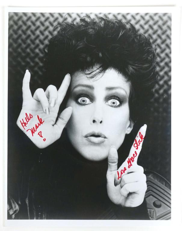 Grace Slick Autograph: Grace Slick signed 8 x 10" black and white picture. Cool picture! ** Lot 14 makes the following guarantee: If either Professional Sports Authenticator (PSA) or Beckett Global, or James Spence Authenti