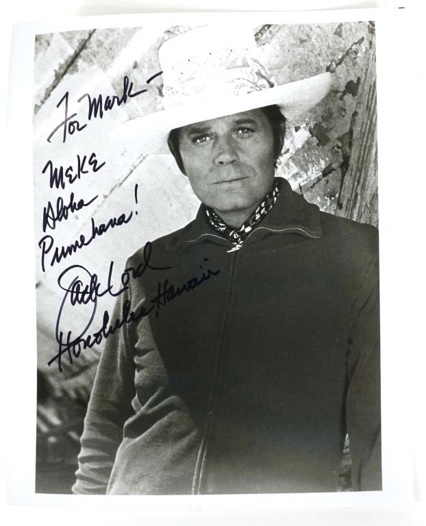 Jack Lord Autograph: Jack Lord signed 8 x 10" black and white picture. ** Lot 14 makes the following guarantee: If either Professional Sports Authenticator (PSA) or Beckett Global, or James Spence Authentication (JSA) rev