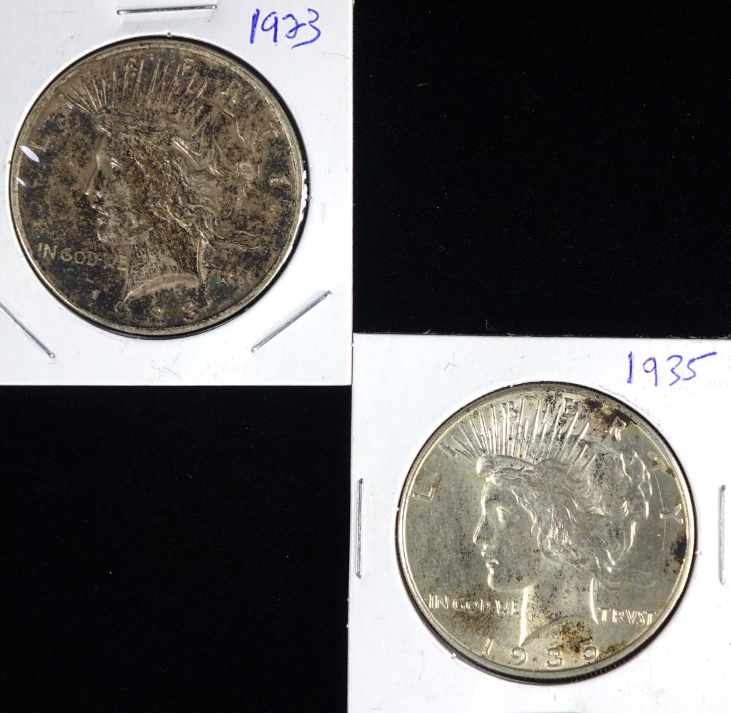 1923 & 1935 Peace Silver Dollars: 2 Peace silver dollars: 1923 and 1935. Both Philadelphia Mint.