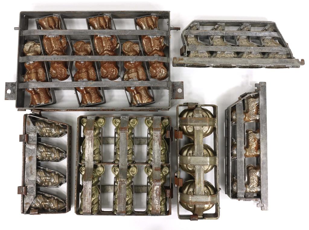 Assortment Of Cake/Chocolate Molds: Assortment Of Cake/Chocolate Molds. 6 different molds including (2) Styles of Rabbits, Wizards, Pumpkins, Teddy Bears & Lambs. They seem to be cast iron.