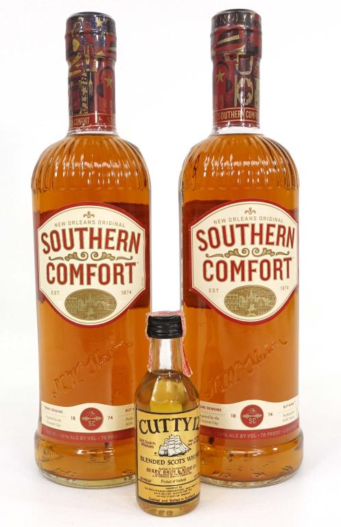 Southern Comfort & Cutty Sark Bottles: IF YOU MAY NEED SHIPPING YOU MUST SPEAK WITH IAN BEFORE BIDDING ON BOTTLES. Southern Comfort (2), sealed, 750 ml, 70 proof. Mini bottle, sealed, 1/10 pint, 86 proof, Cutty Sark.
