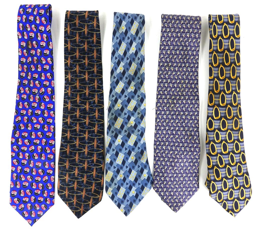 Five Mens Ties: Includes two Gucci ties- made in Italy; also some staining on one of the Gucci ties. Joseph Abboud. Graham & Lockwood. Andy Warhol- some staining on tie.