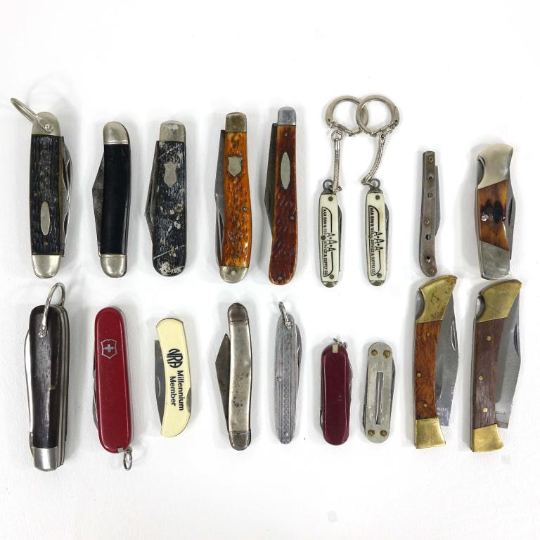 Assortment Of Knives (Incl. NRA Life Member Knife): Assortment of vintage knives. Includes Victorinox, Bear MGC Cutlery, a Lakota NRA Millennium Life Member knife (Made in Japan), Sabre, Klein & Sons, Lark, Ulster, and a few unmarked.