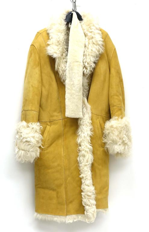 Feraud Light Brown Suede and Shearling Coat: Feraud light brown suede and shearling coat. Made in Canada. Style #: F4612. Size: 16. Includes a fur headband.