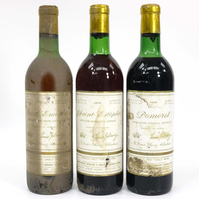 3 Wine Bottles: IF YOU MAY NEED SHIPPING YOU MUST SPEAK WITH IAN BEFORE BIDDING ON BOTTLES. 2 x 1970 Saint Estephe red table wines. 1969 Pomerol red table wines.