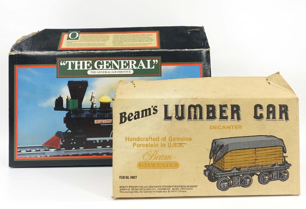 (2) Beam Train Decanters: **IF YOU MAY NEED SHIPPING YOU MUST SPEAK WITH IAN BEFORE BIDDING ON BOTTLES** "The General Locomotive," in box with strip. "The Lumber Car," in box.