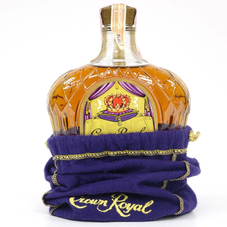 1973 Crown Royal Whiskey Bottle: **IF YOU MAY NEED SHIPPING PLEASE GIVE US A CALL AT 847-625-0555 BEFORE BIDDING ON BOTTLES!*** 1973 Crown Royal. 80 Proof, 750ml.