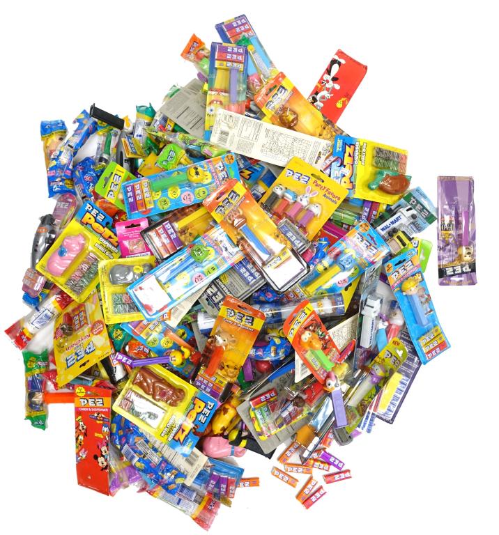 Massive Lot Of Pez Dispensers (Still Sealed!): Massive Lot Of Pez Dispensers (Still Sealed!). Contains about 18.6lbs of items none of which have been opened. Many are vintage.