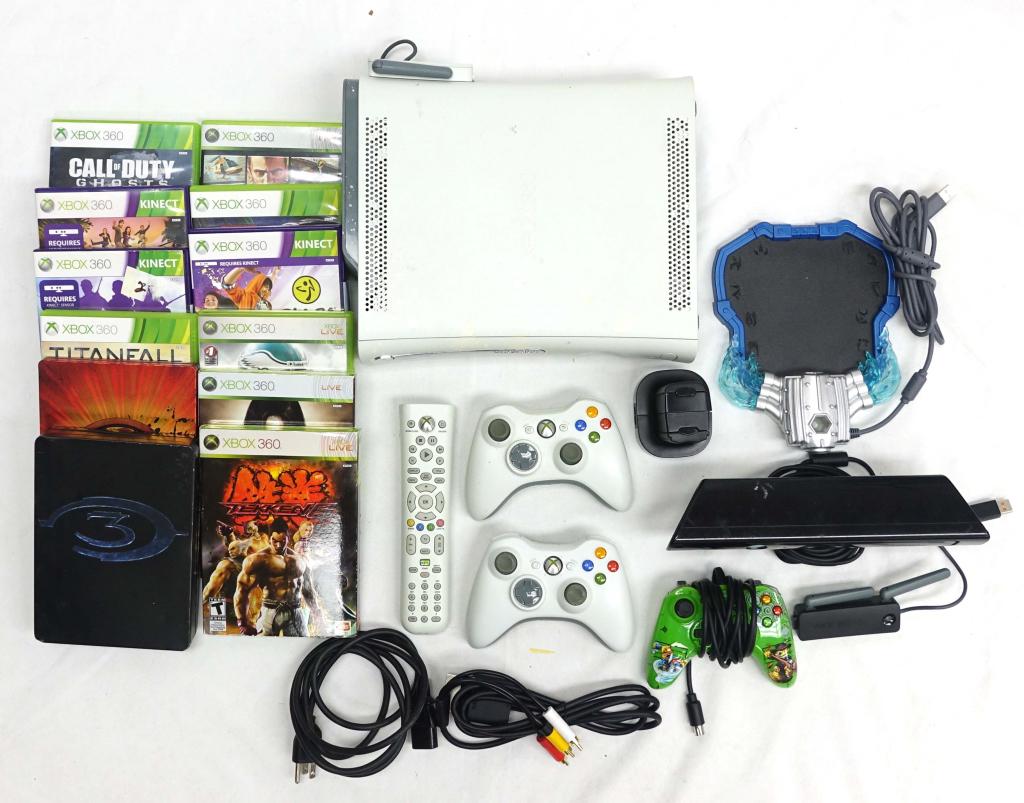 Xbox 360 (With Games & Accessories!): Xbox 360 (With Games & Accessories!). Includes (10+) games, (2) controllers, as well as Kinect. However it seems to be missing some of the cables needed to power the system.