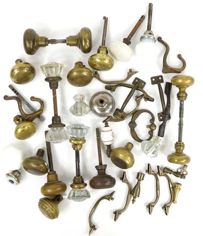 Vintage or Antique Doorknobs & Finials: Vintage Or Antique Doorknobs & Finials. Includes (2) sets of Glass doorknobs & (2) sets of Brass doorknobs. Also includes (2) individual Glass knobs, (10) individual Brass knobs, (3) Milk Glass knobs 